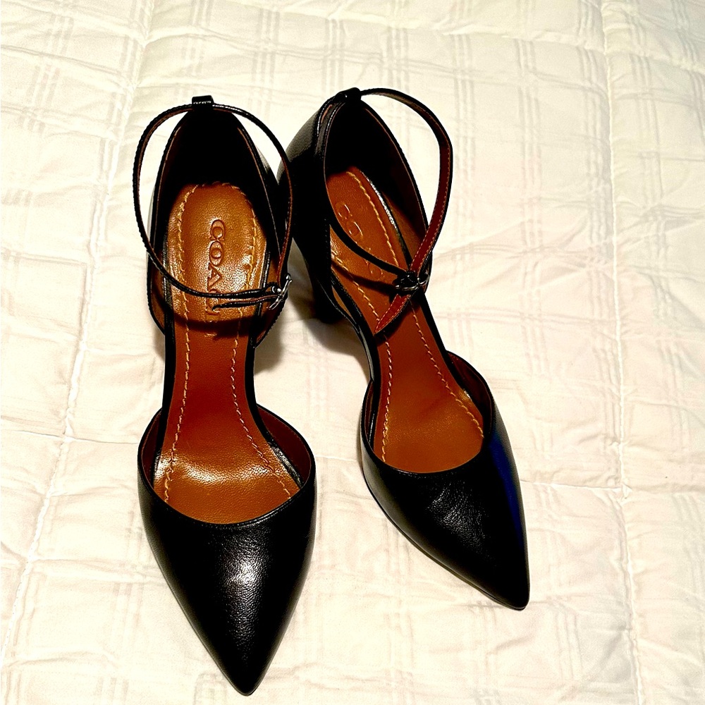 Slightly worn but in excellent condition Coach Black ankle strap shoes.